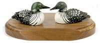 Female Common Loon Ducks on a Base